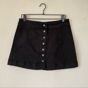 Free People black denim snap front mini skirt